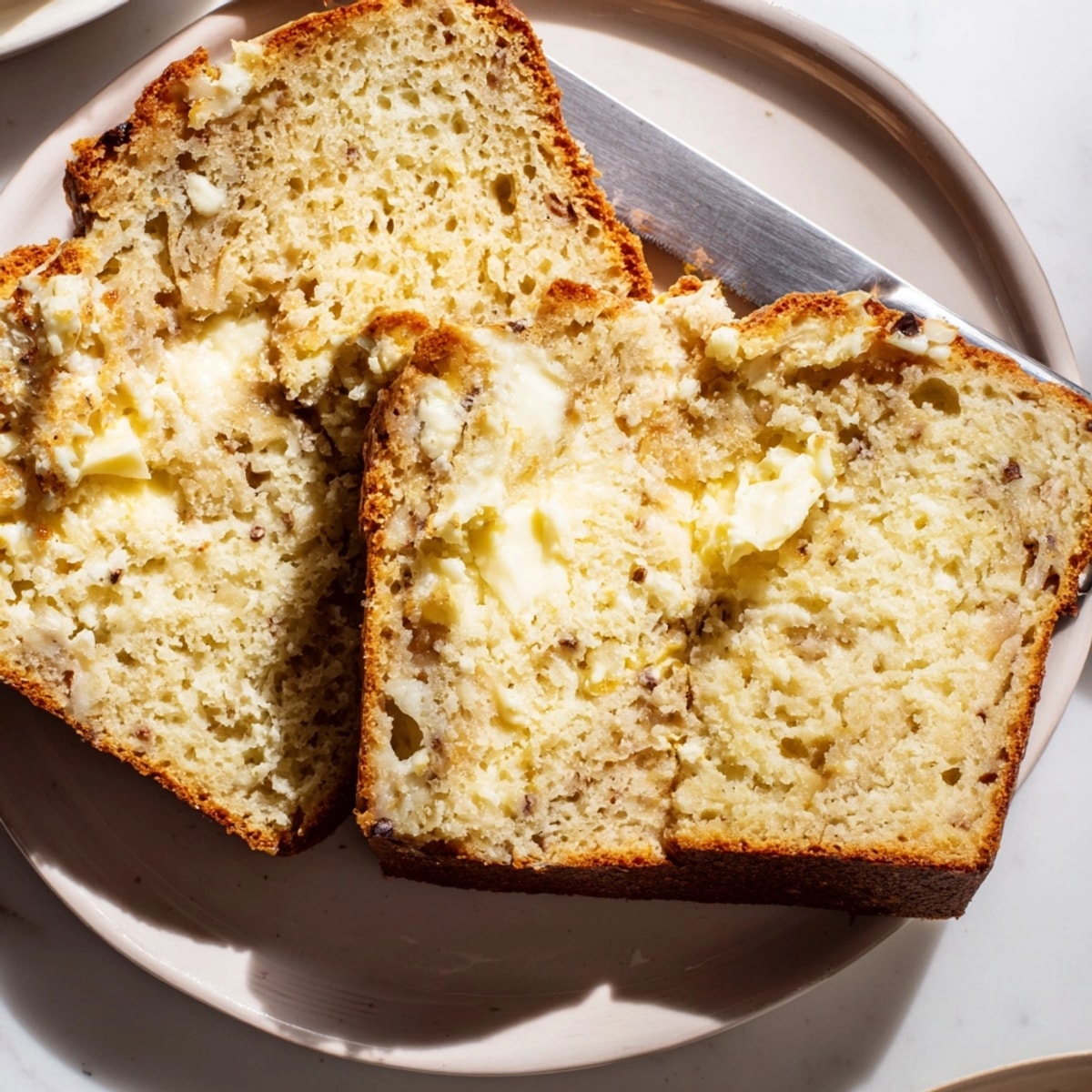 Golden Ricotta Vanilla Bean Bread loaf; soft crumb, vanilla flecks visible.