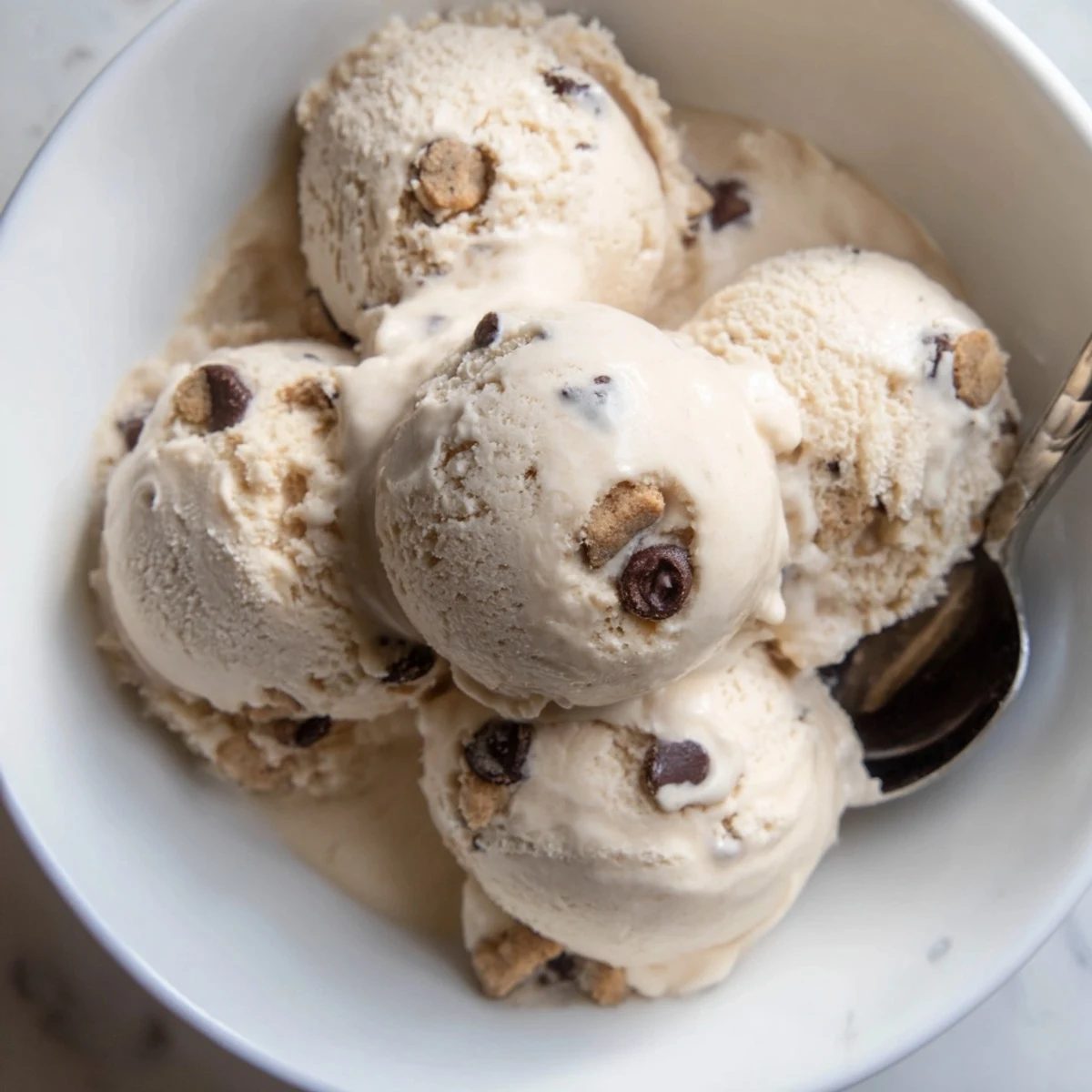 Creamy cottage cheese ice cream with cookie dough, topped with mini chocolate chips.  