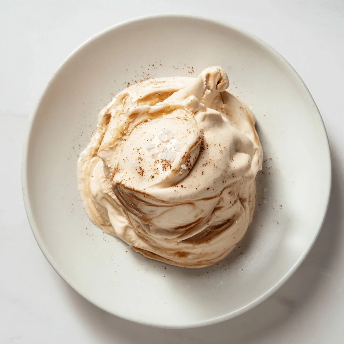 Creamy Peanut Butter Banana Ice Cream swirled with peanut butter, perfect for a cold and healthy dessert.