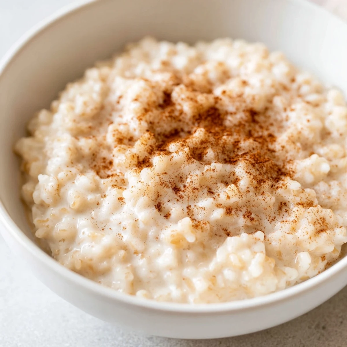 The comforting smell of cinnamon fills the air as this simple rice pudding with leftover rice simmers.