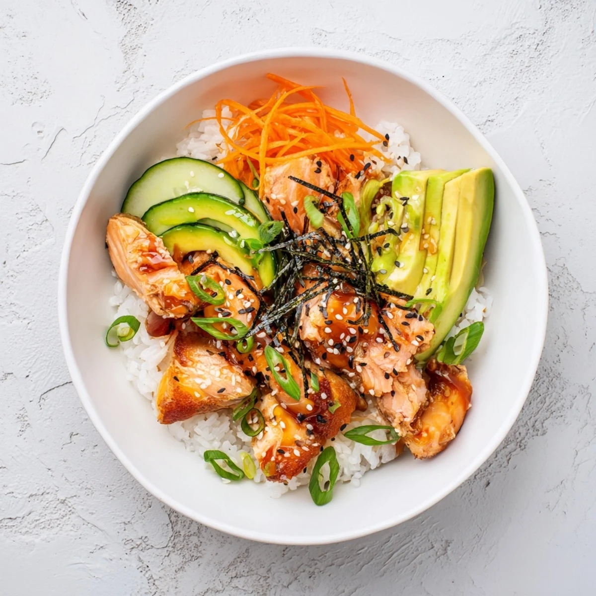 Japanese-Style Salmon & Chicken Rice Bowl with flaked salmon and sliced chicken, a savory delight.