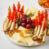 A visually appealing array: the Flickering Fire Log Snack Board, brimming with textures and flavors.
