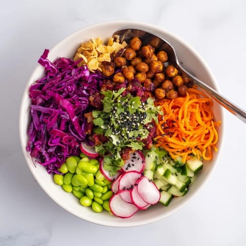 Vibrant ASMR Crunch Snack Bowls featuring crunchy textures and spicy mayo on the side.  