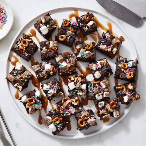 Close-up shot of decadent Chaos Chocolate Cake Bites: a whimsical, colorful dessert for parties.